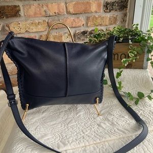 Clarks pebbled leather navy blue crossbody bag.